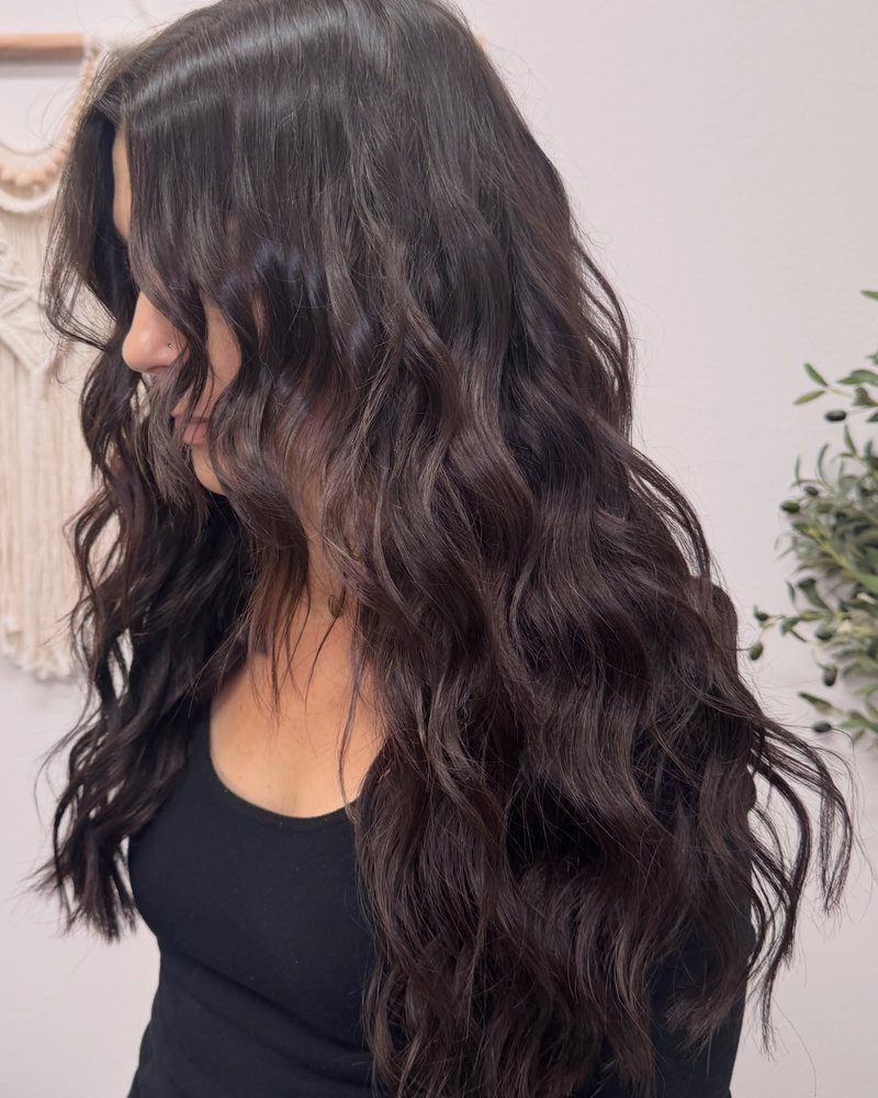 Soft, glossy brown lob with bend and shine after a gloss service by the Redken Pro Gloss Awards winner in Auburn, California.